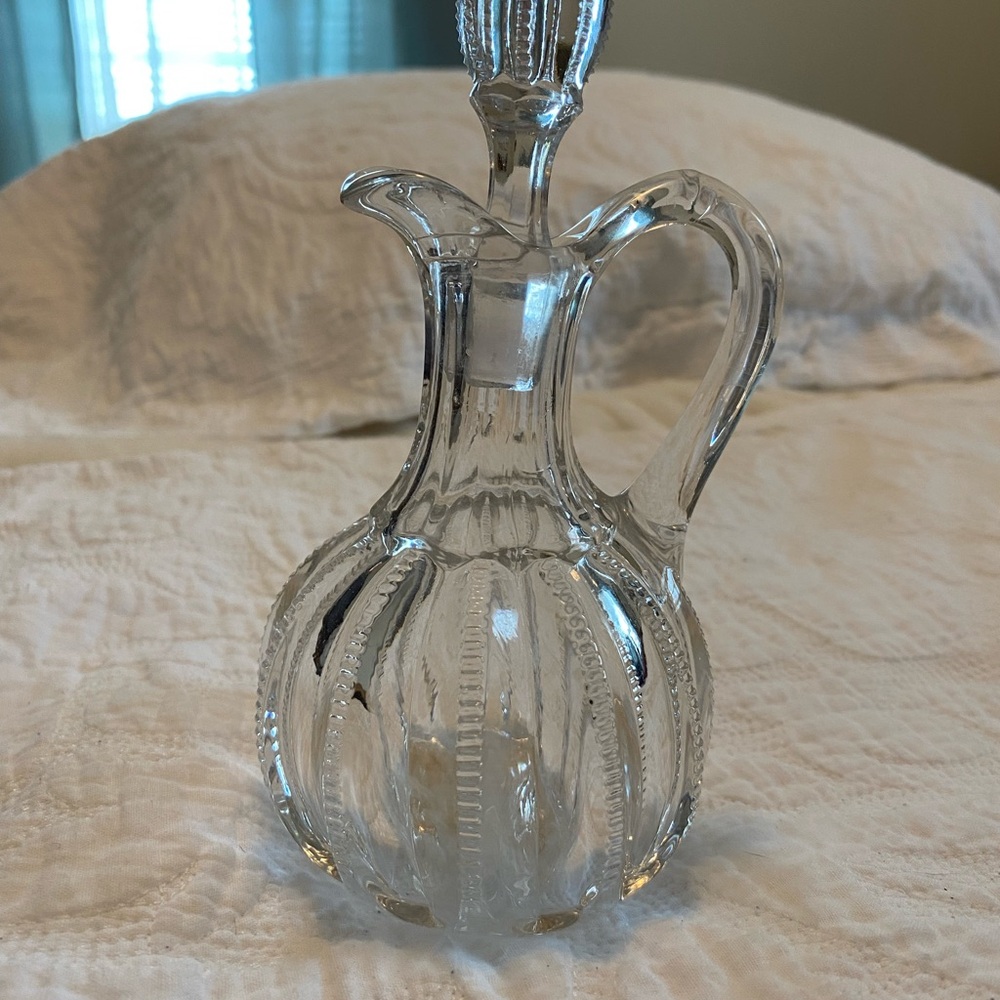 Vintage oil and vinegar, zipper shaped glass CRUET 6 3/4 inch high.